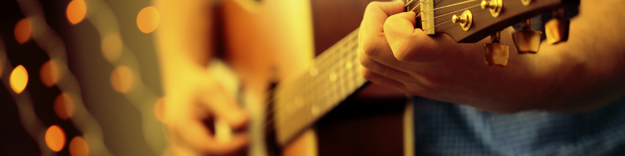 Man playing guitar, event, evening